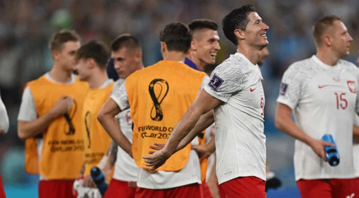 Lewandowski celebrates ‘happy defeat’ as Poland go through to next round