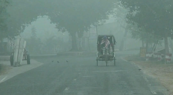 নওগাঁয় তাপমাত্রা বাড়লেও কমেনি শীতের দাপট